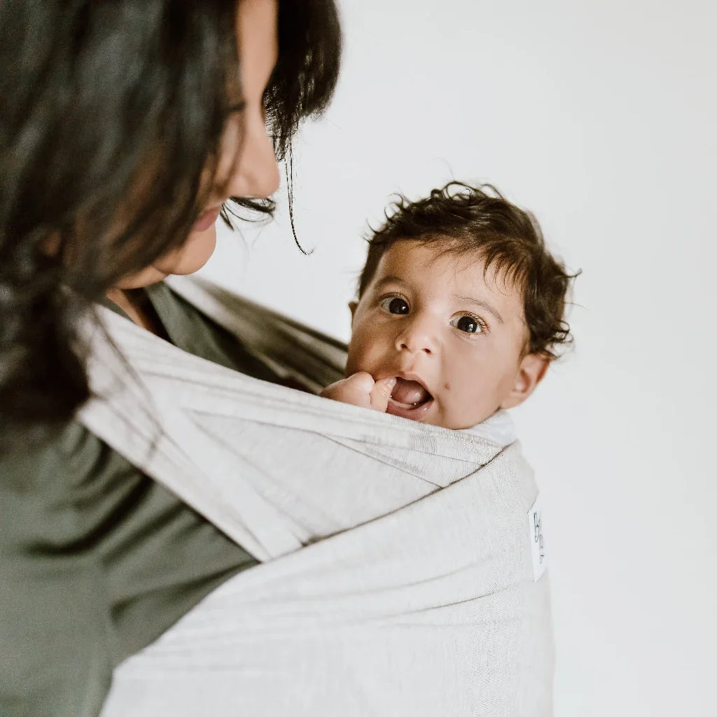 baby carriers canada women with sleeping baby