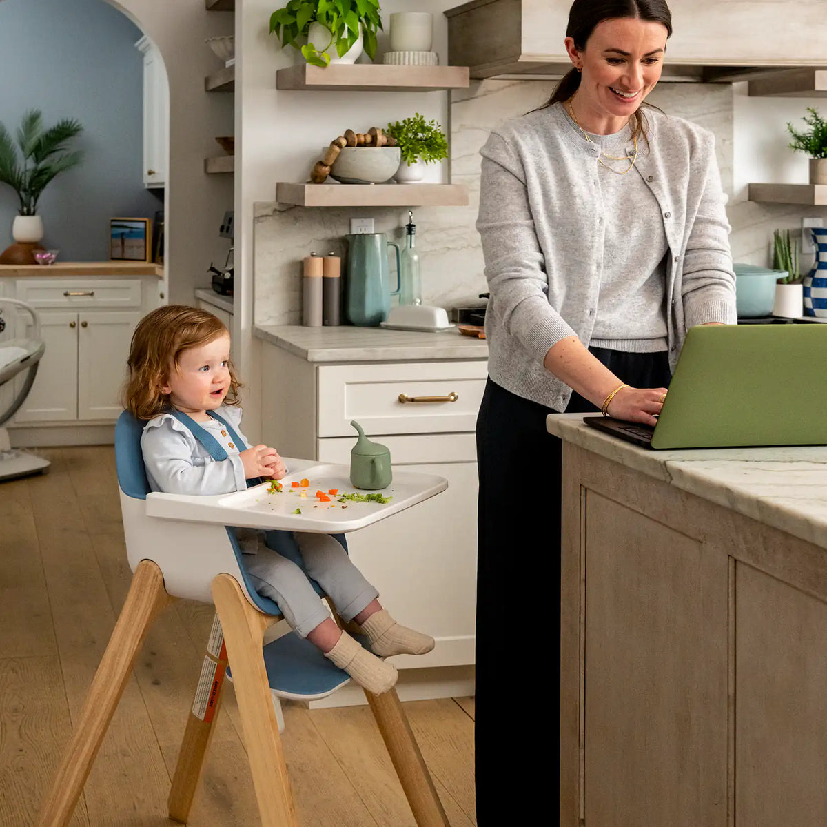 highchair canada child siting with parents