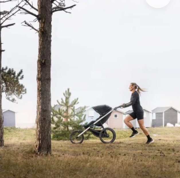 jogging stroller with my mom pushing in the park