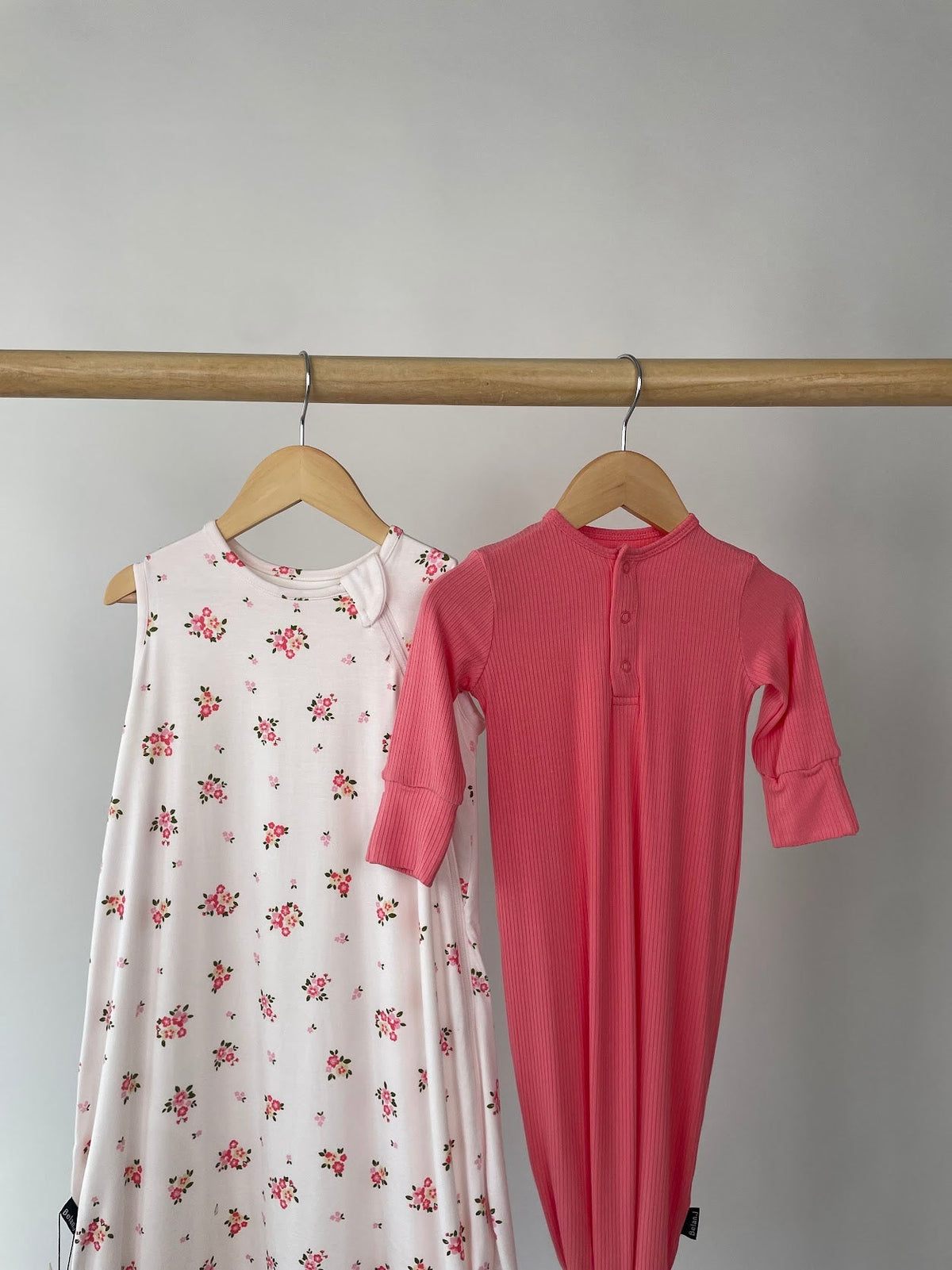 baby sleep gown with baby sleeping on cushion