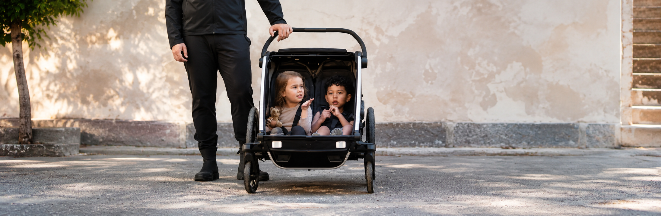 thule chariot canada 2 kids sitting 